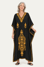 Model wearing the black and mustard Kashmir cotton butterfly kaftan, front view